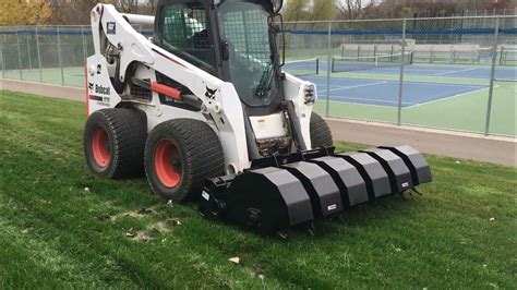 skid steer trencher attachment reviews|caterpillar skid steer aerator attachment.